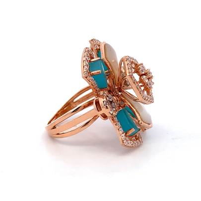 CLASSIC FLORAL RING FOR LADIES WITH AMERICAN DIAMONDS AND BLUE EMERALD STONE  Rings