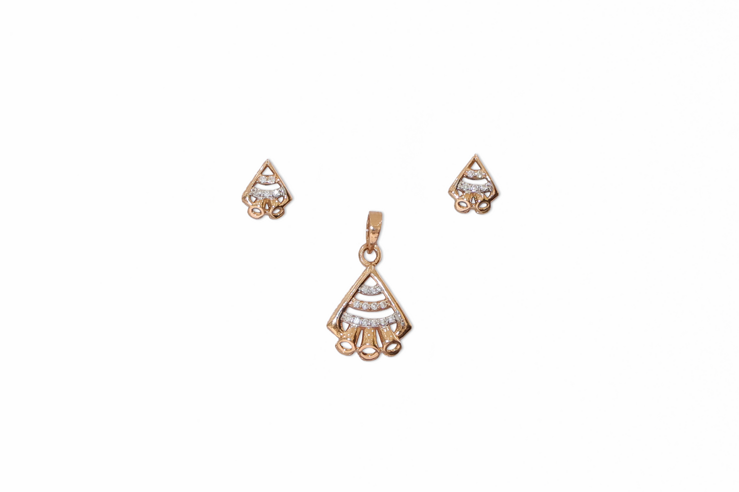 Gold jewelry set with a pendant and earrings on a white background