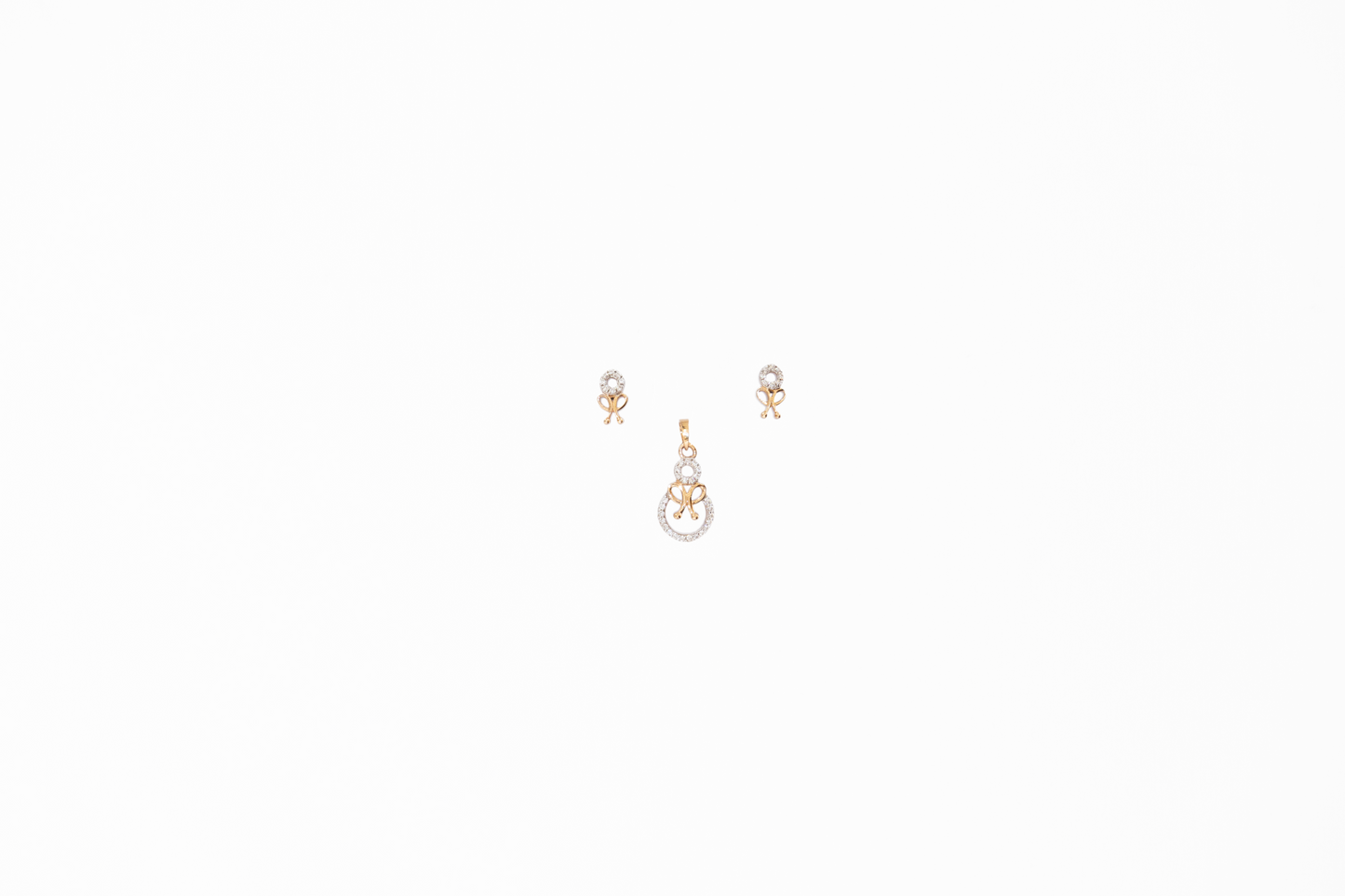 Pair of gold earrings on a white background