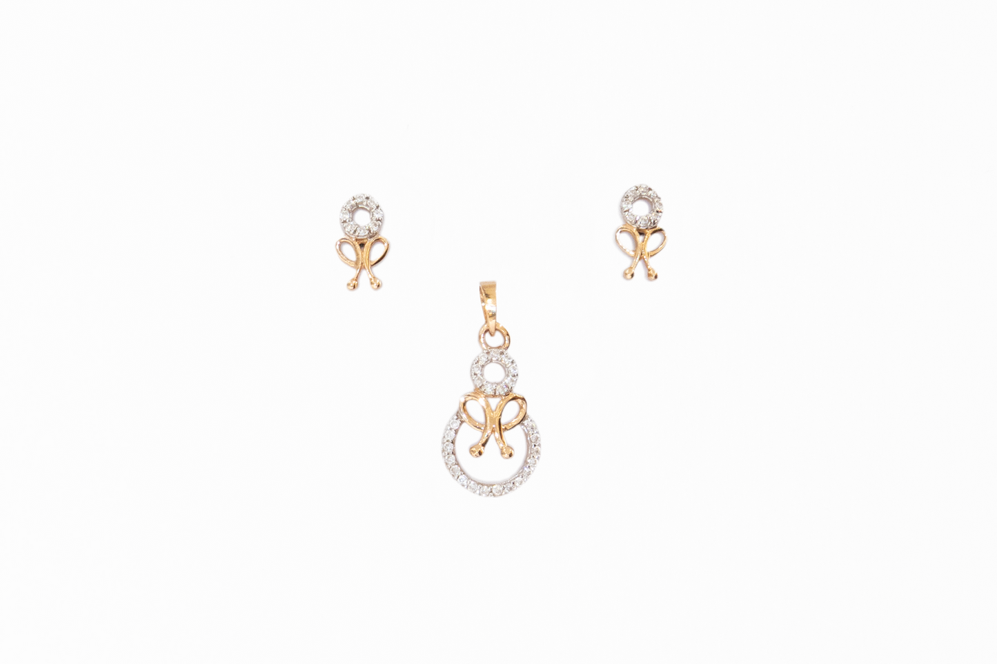 Gold and silver jewelry set with pendants on a white background