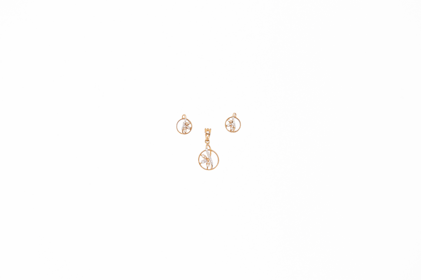 Two gold pendants on a white background