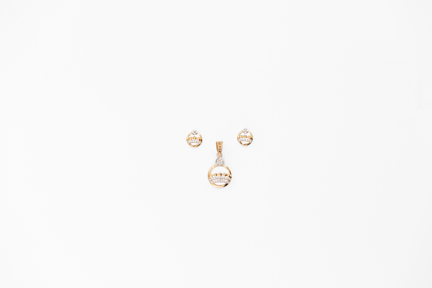 Gold earrings with a white background