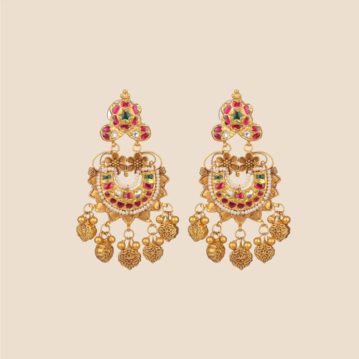 Ornate gold dangle earrings featuring a floral top with red and green stones, a pearl-lined crescent motif with red gems, and hanging textured gold drops.