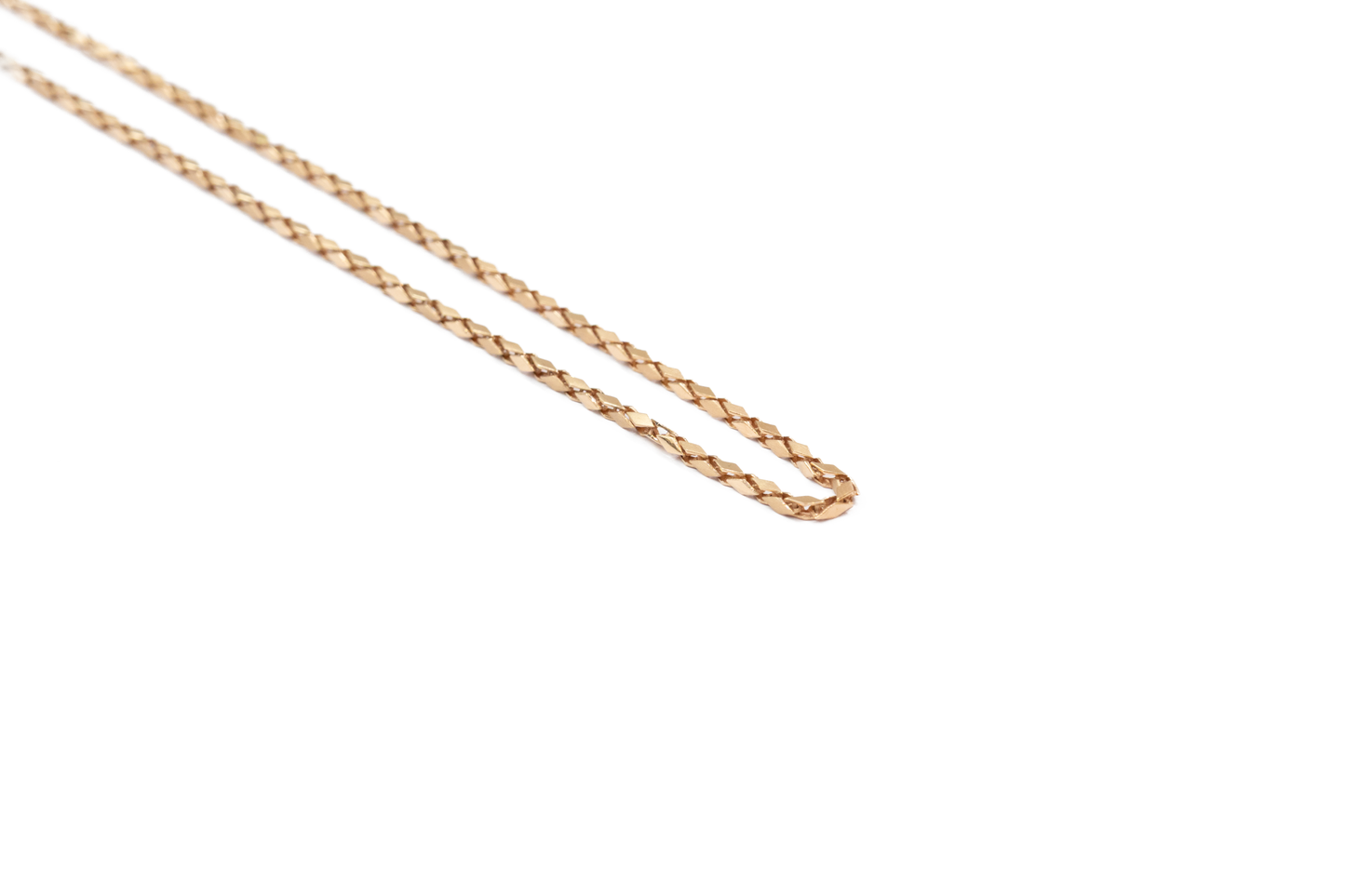 Gold chain on a white background
