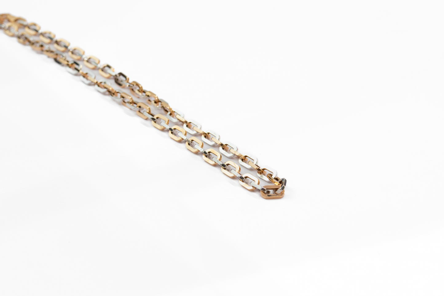 Gold chain on a white background