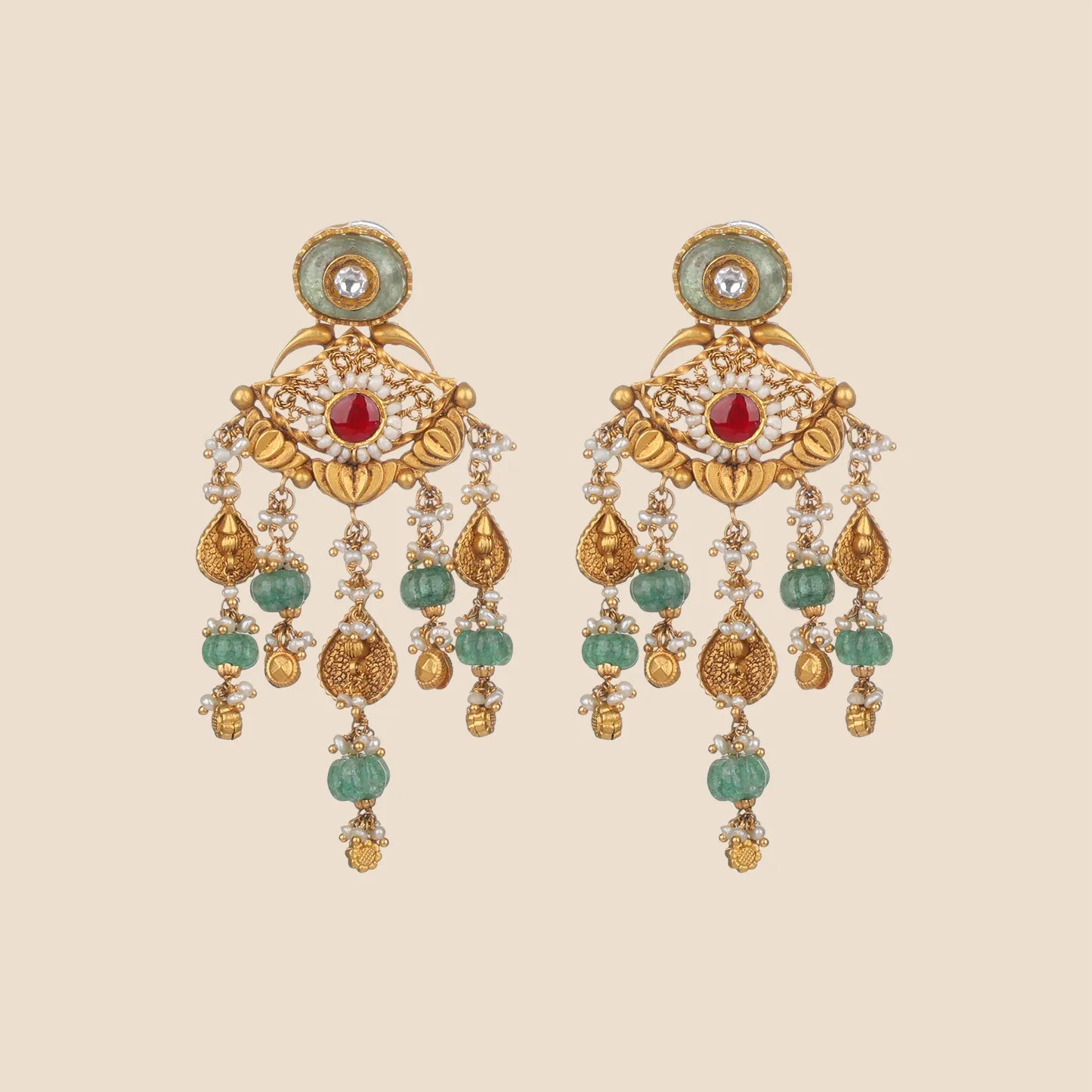 A pair of matching gold drop earrings with circular red and green stone studs, intricate gold floral frames, and three textured gold dangles.