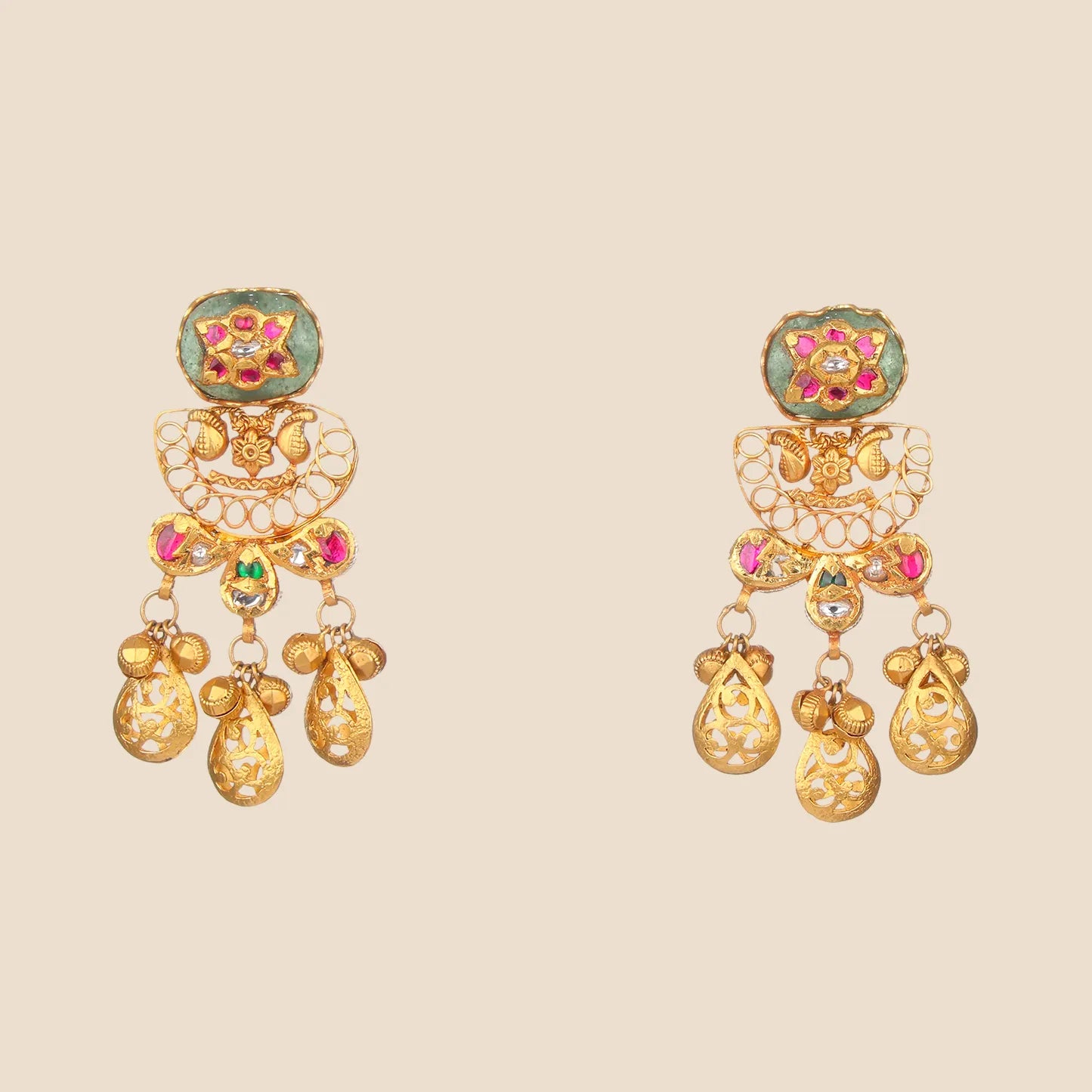 Gold earrings with emerald and ruby accents and teardrop danglers.