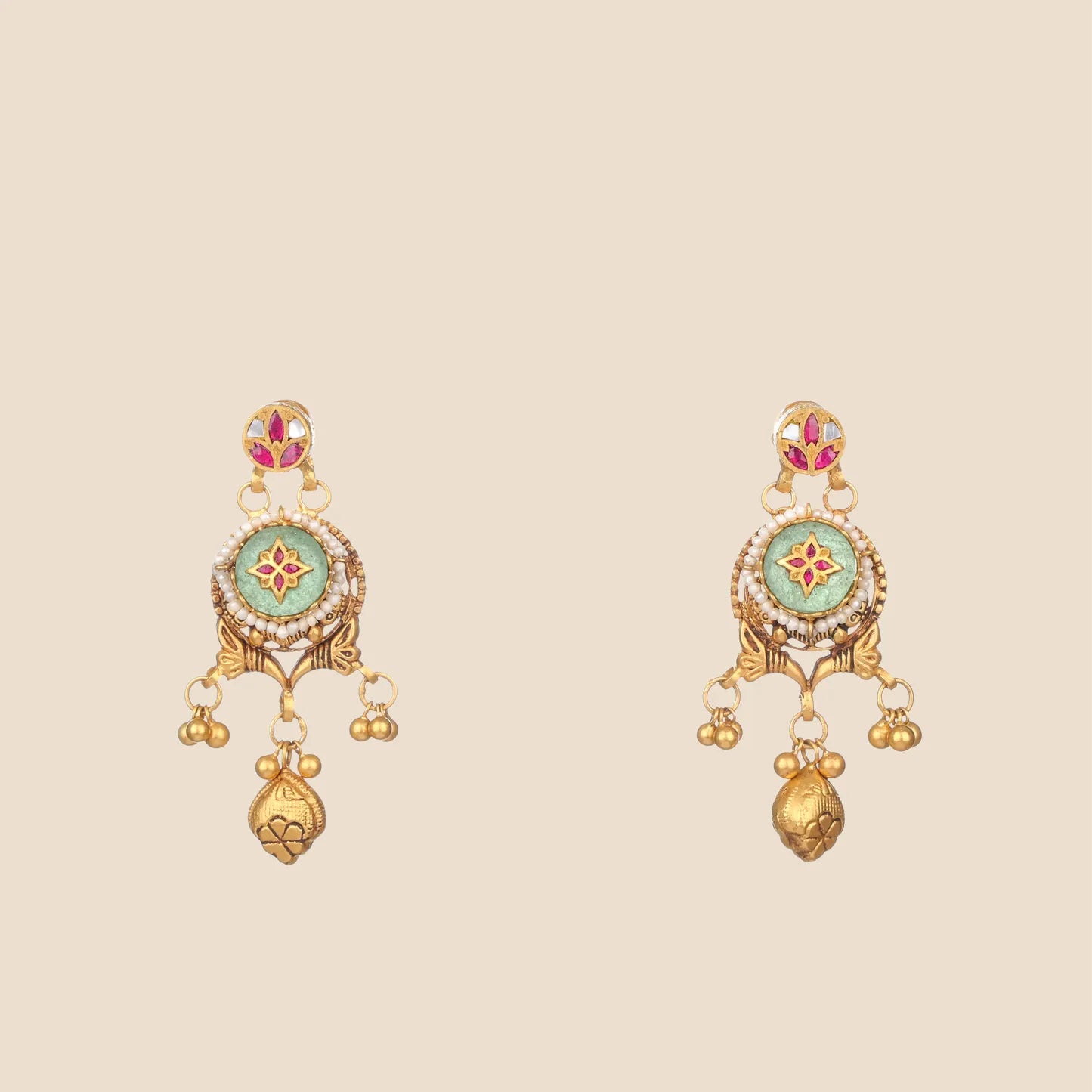 Gold temple-style earrings with emerald enamel center, pink accents, and a single drop charm.