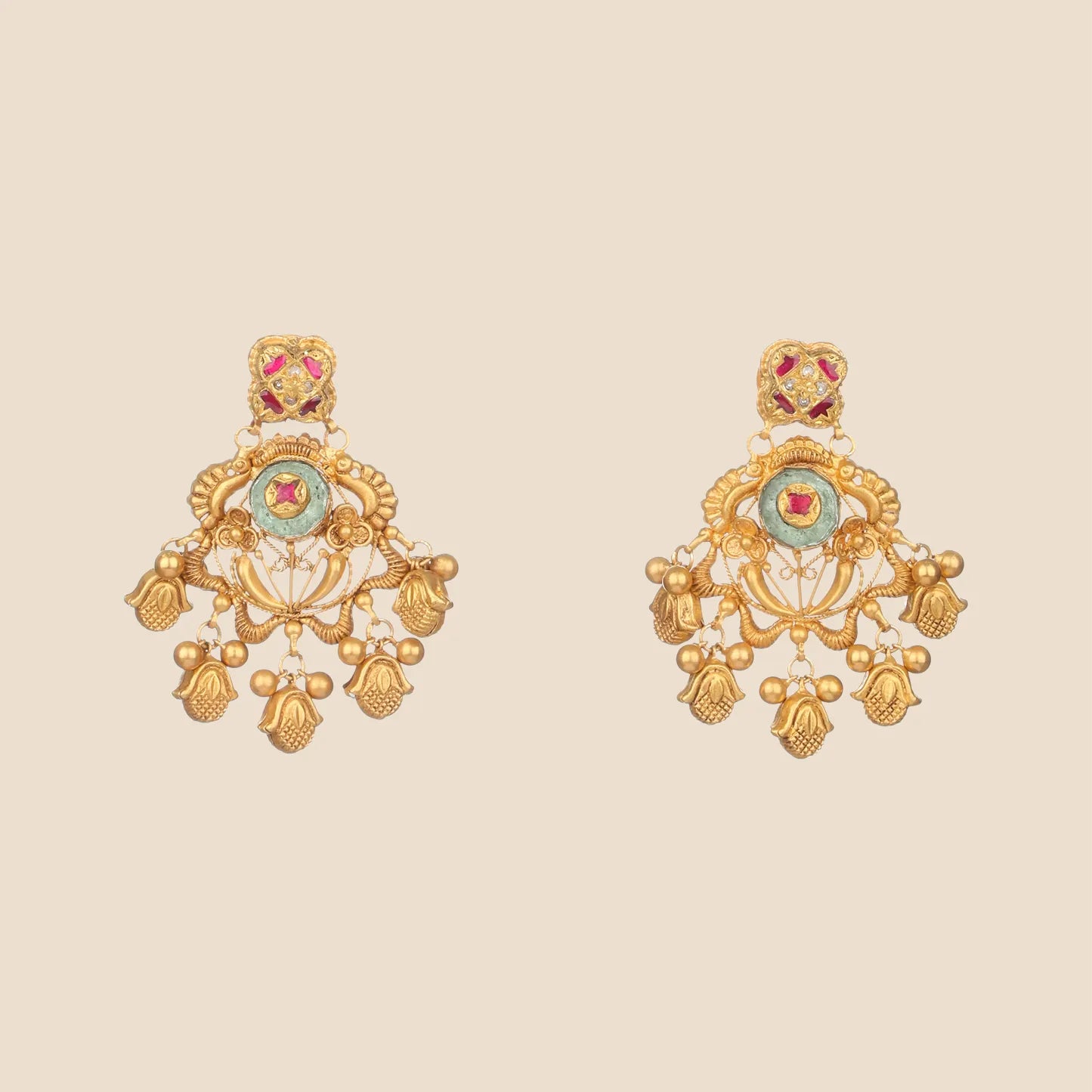 Gold filigree earrings with pink and green stone accents and dangling bell charms.