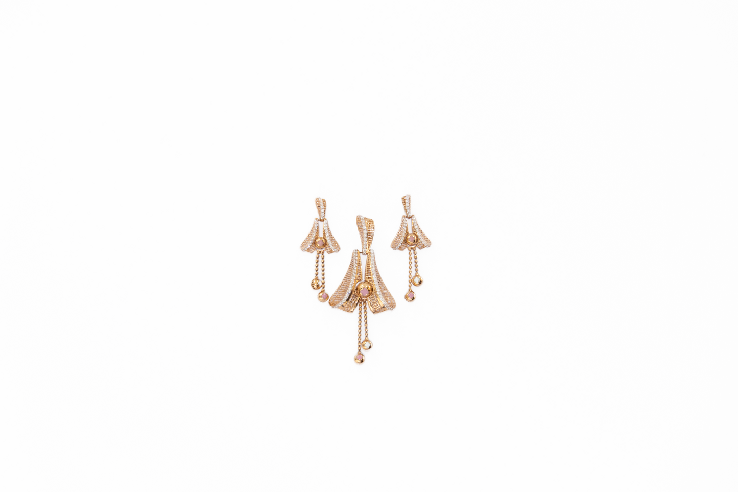 Pair of gold earrings on a white background