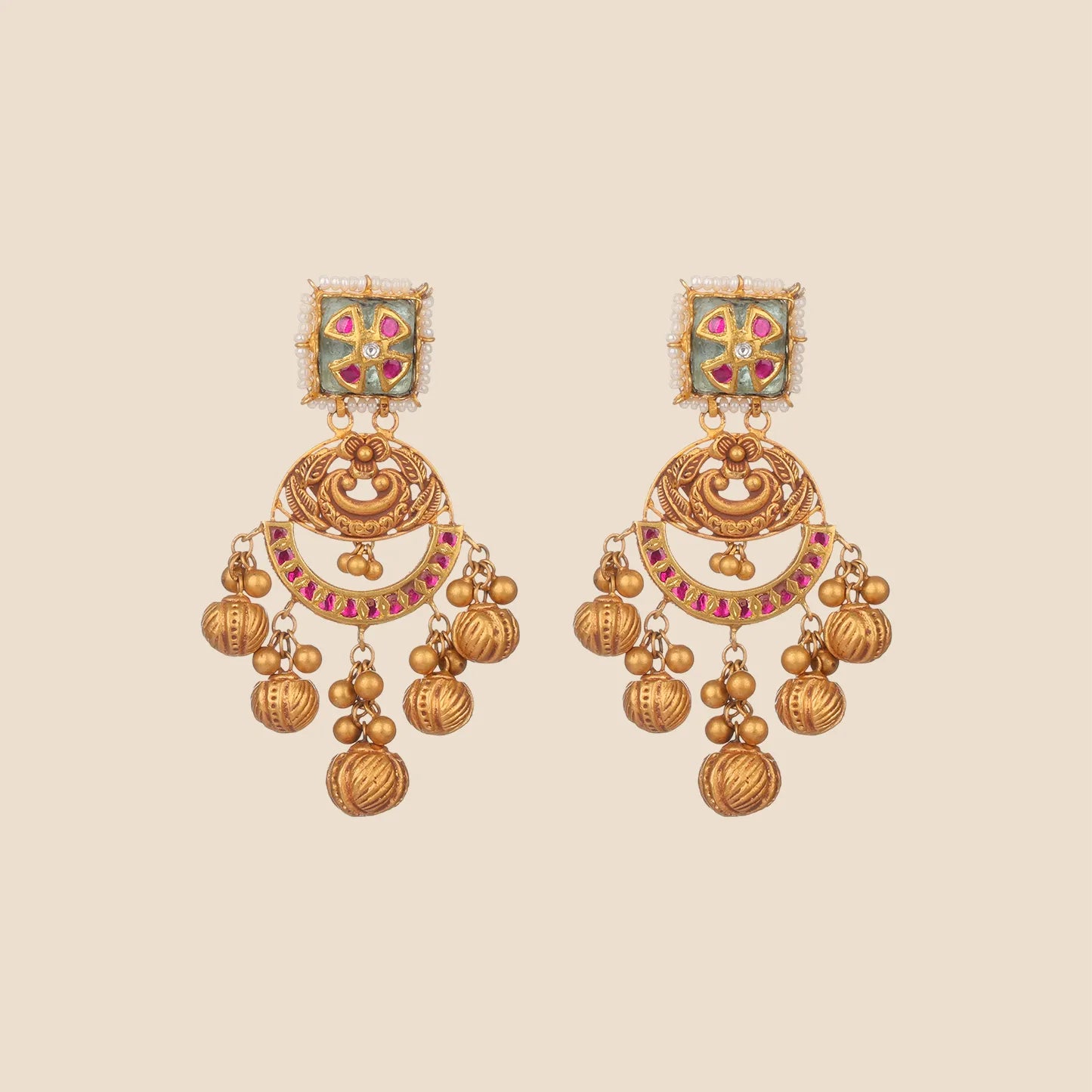 Antique gold chandbali earrings with square kundan and pearl stud tops, ruby-studded crescent arches, and cascading textured gold ball tassels.