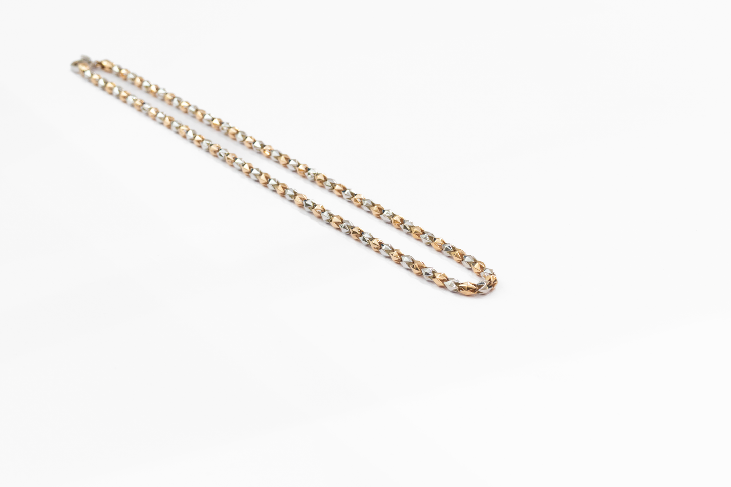 Gold chain on a white background