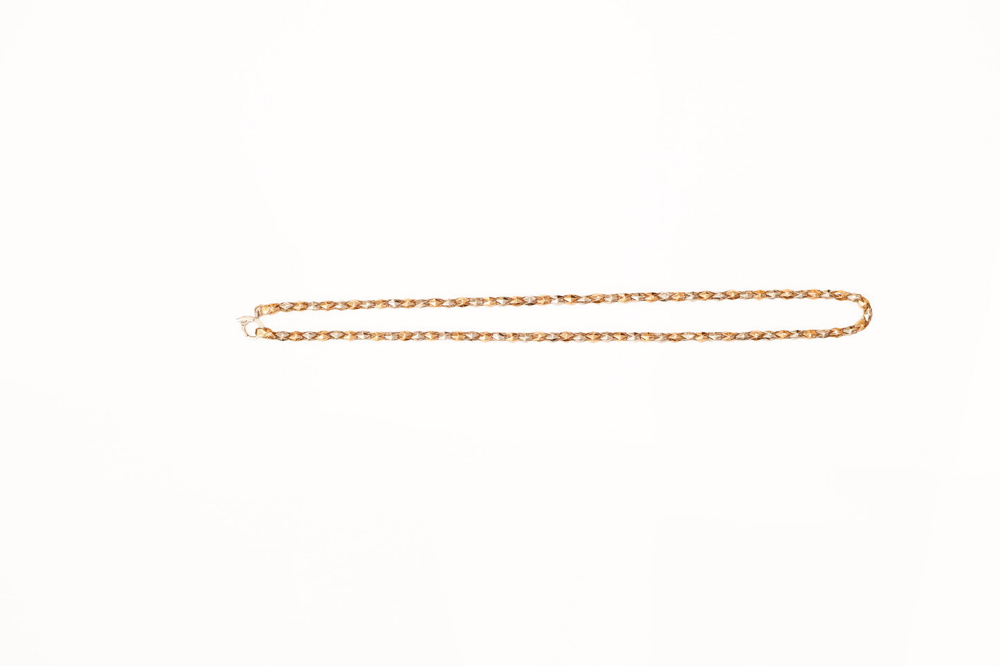 Gold chain on a white background