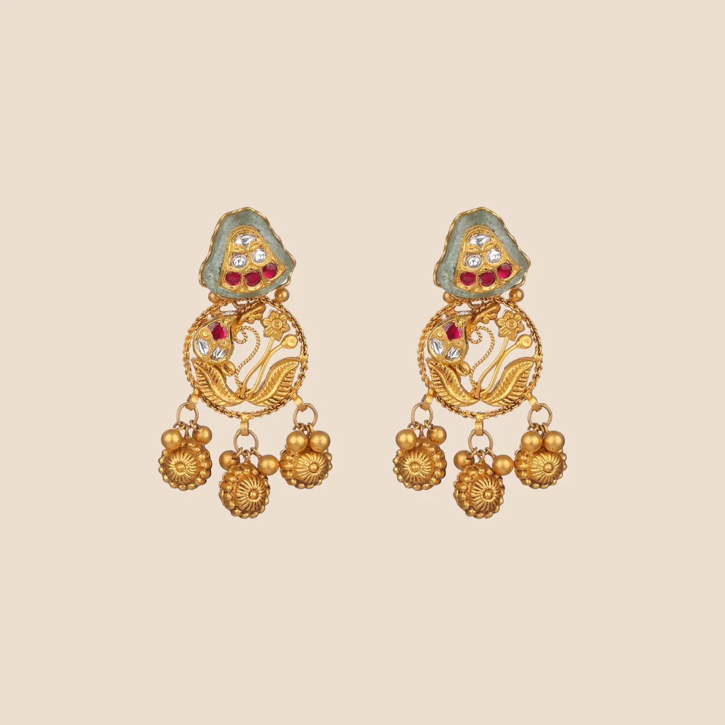 Gold dangle earrings featuring a pink enameled floral top, a triangular pearl-bordered center with green and clear stone inlays, and dangling textured gold beads.