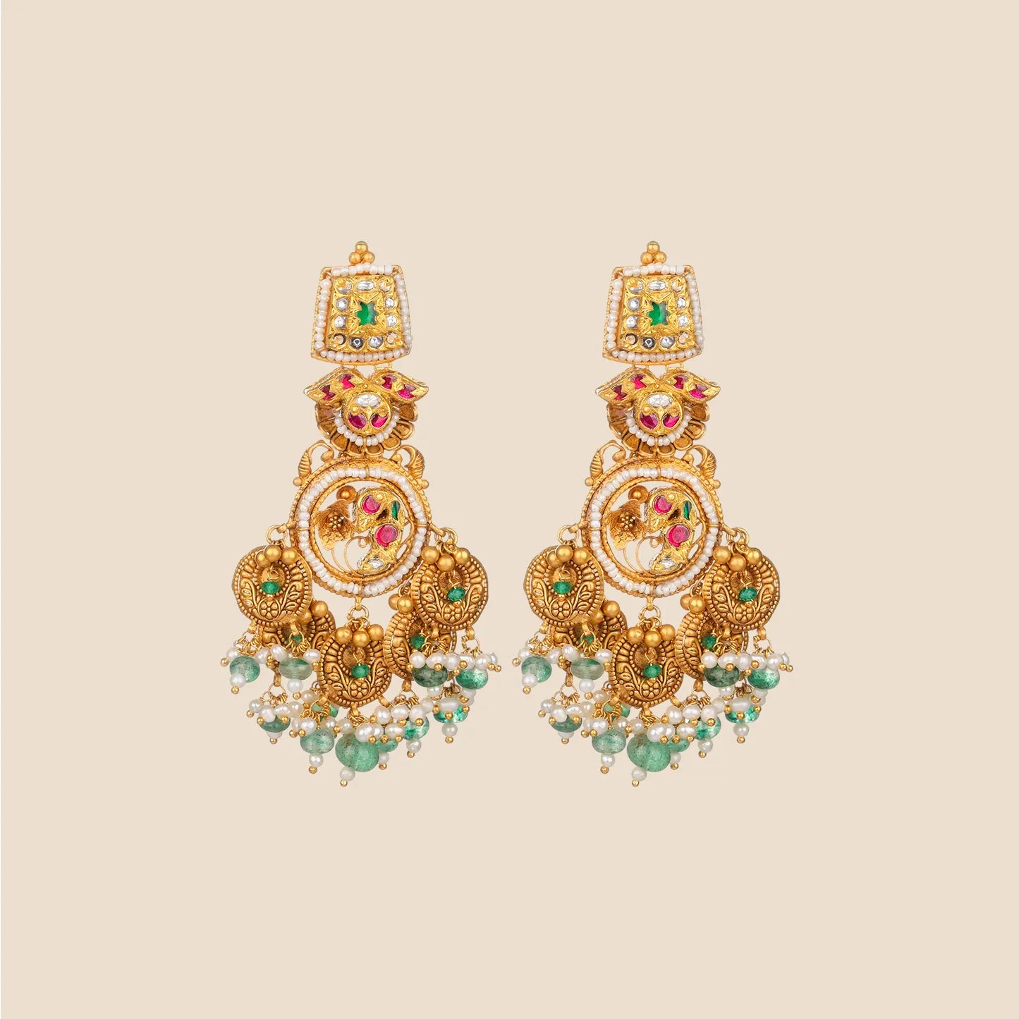 Ornate gold dangle earrings featuring a bird motif, accented with pink and green stones, pearl borders, and hanging gold coins with green bead drops.