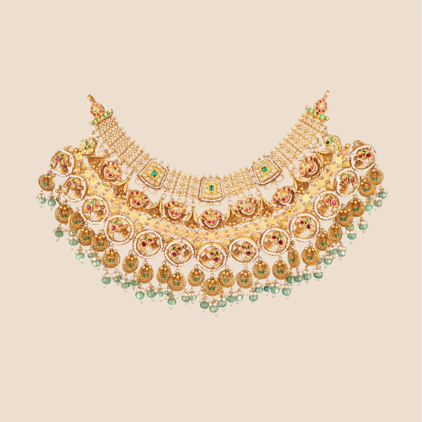 Elaborate multi-tiered gold choker necklace detailed with bird motifs, pink and green stones, pearl borders, and cascading gold coins with green beaded fringes.