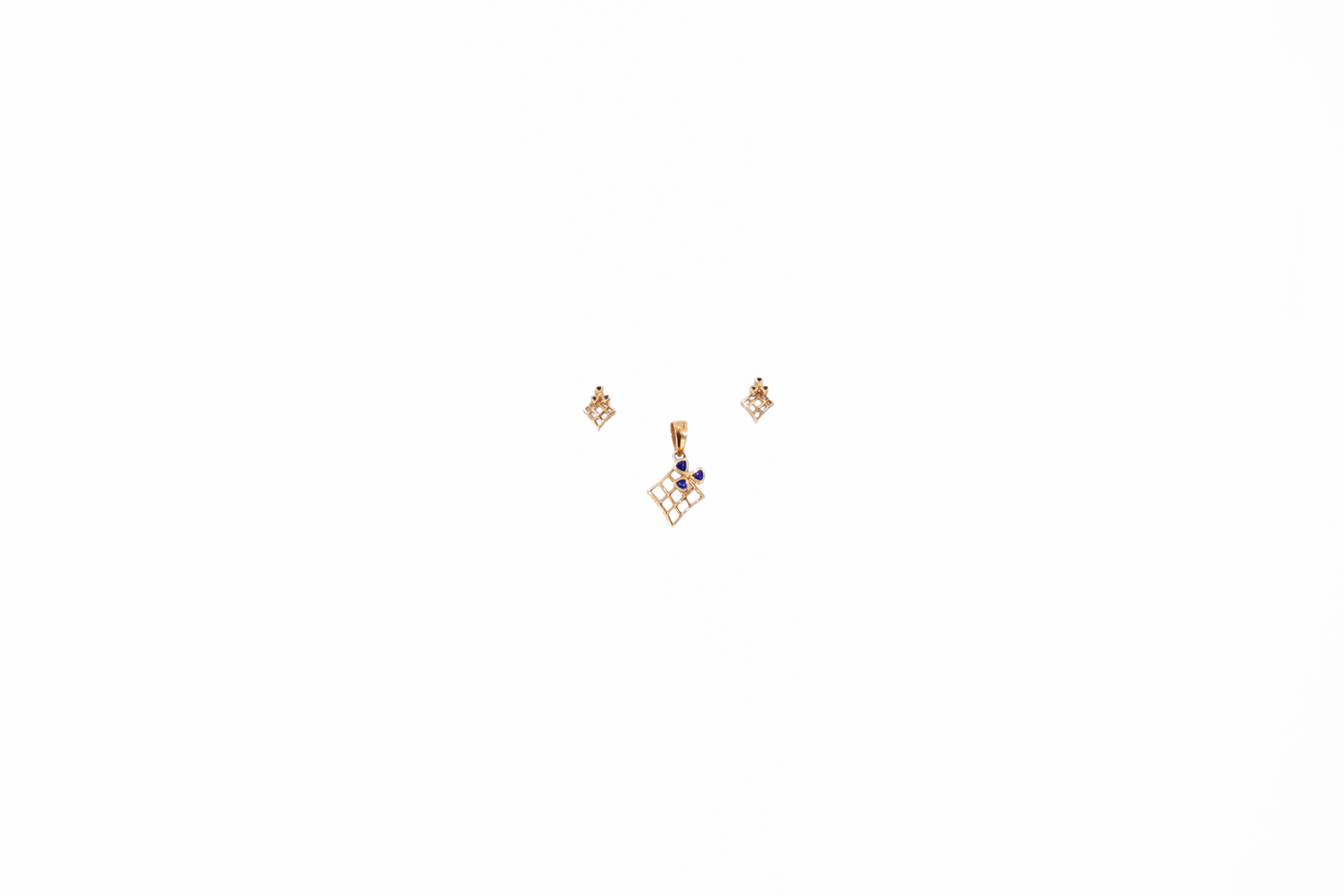 Pair of gold earrings with blue gemstones on a white background