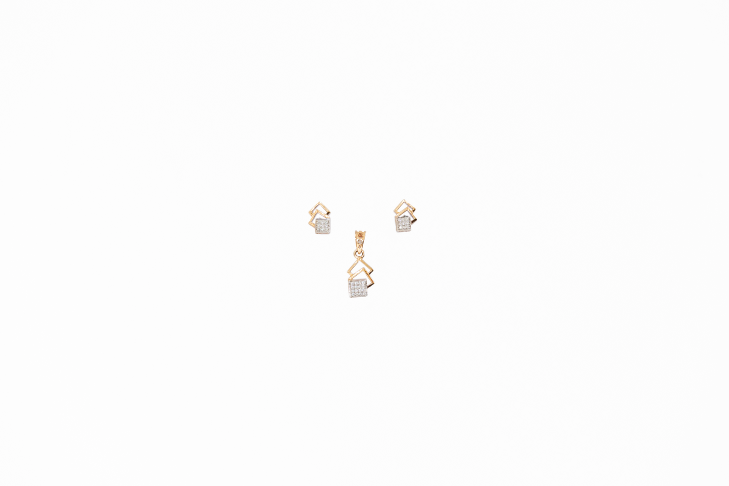 Pair of gold earrings on a white background