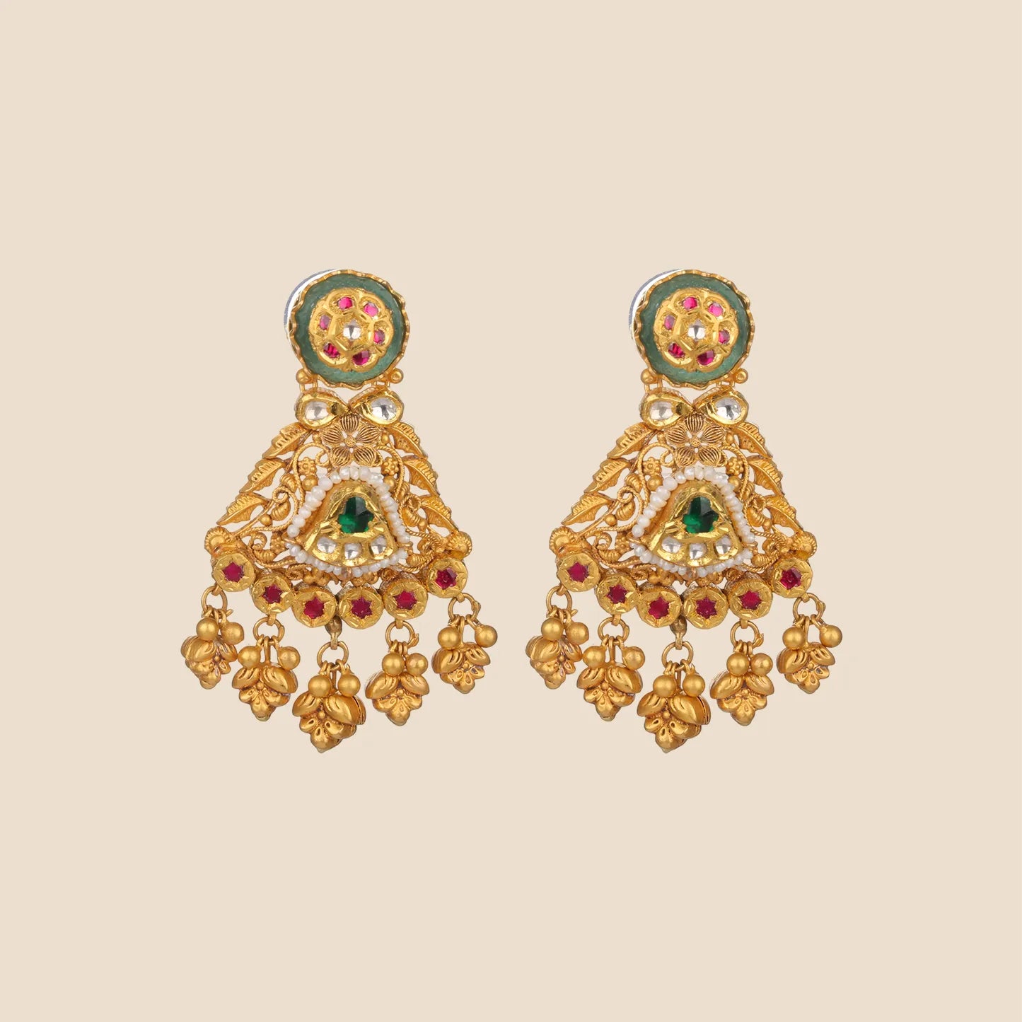 A pair of matching gold drop earrings with circular green and red stone studs and triangular filigree dangles with small gold beads.