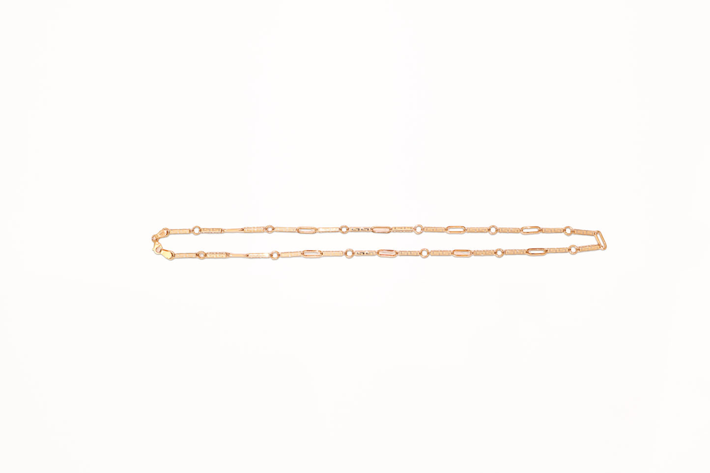 Gold chain on a white background