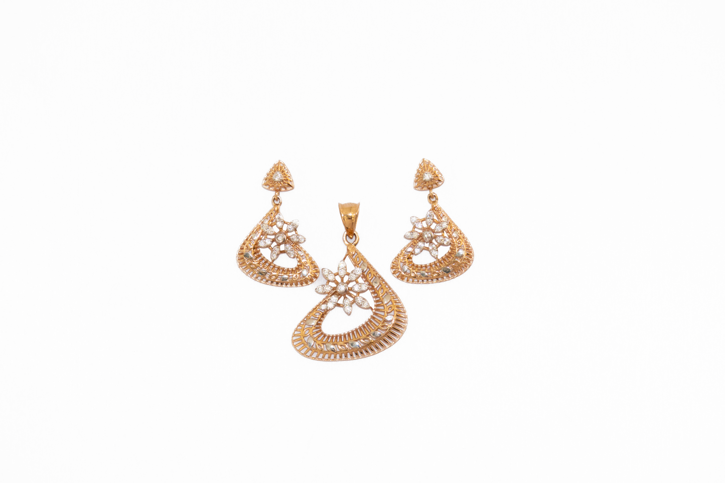 Pair of gold earrings on a white background
