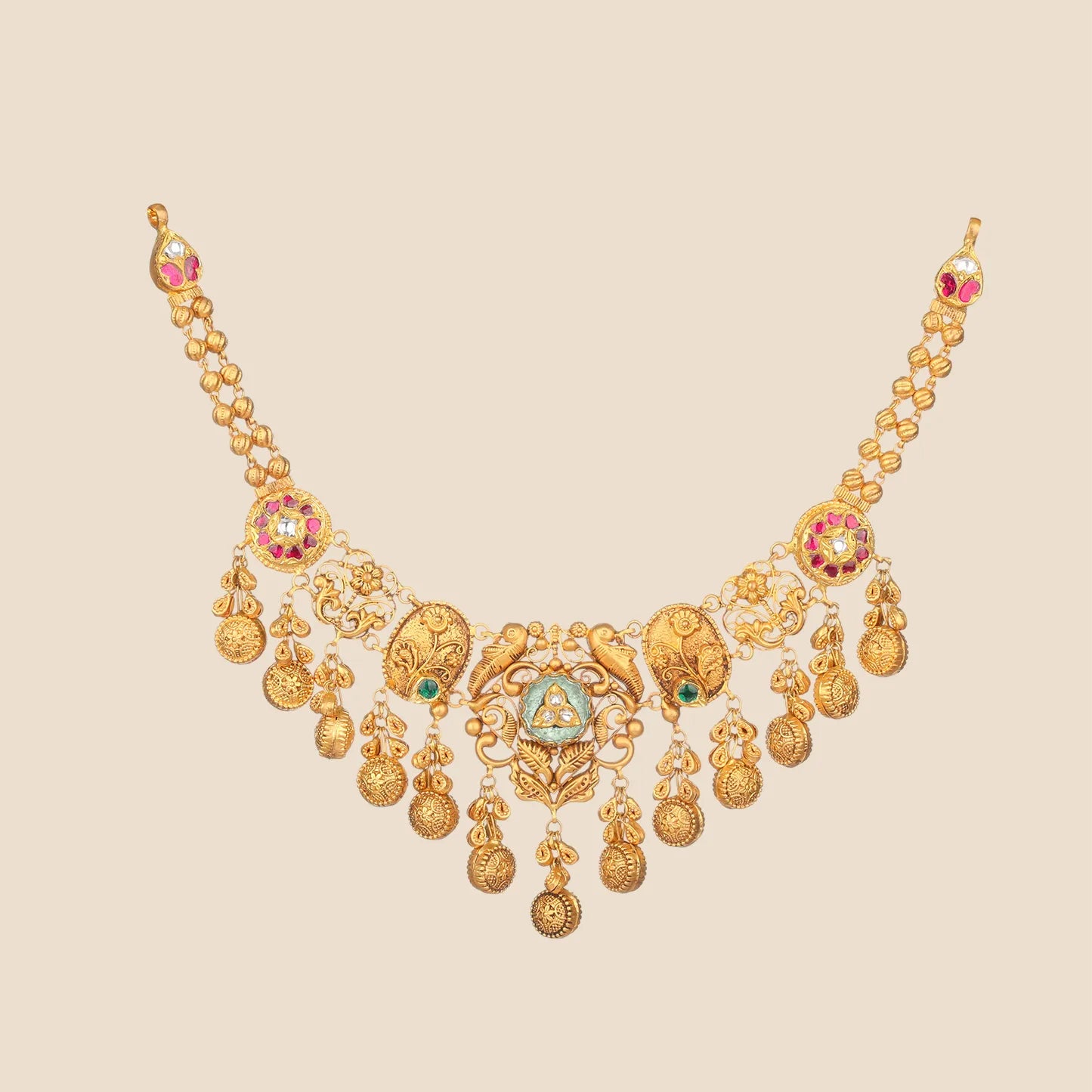 Antique-style gold dual-tier choker necklace featuring intricate gold filigree, multi-tiered beadwork, small kundan and ruby-colored stones, stylized parrot motifs, and multiple dangling coin elements.