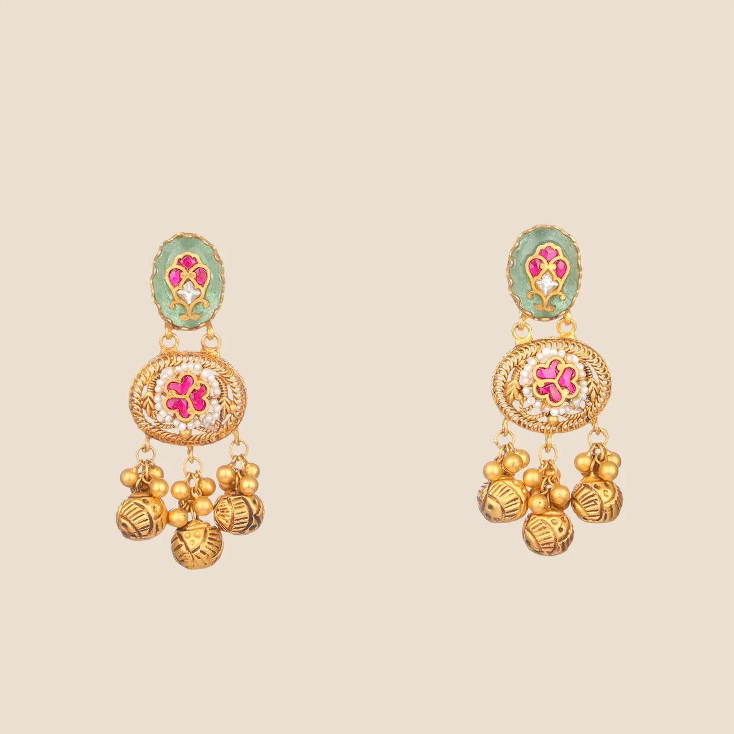 Gold temple earrings with green enamel, pink accents, and dangling bead charms.