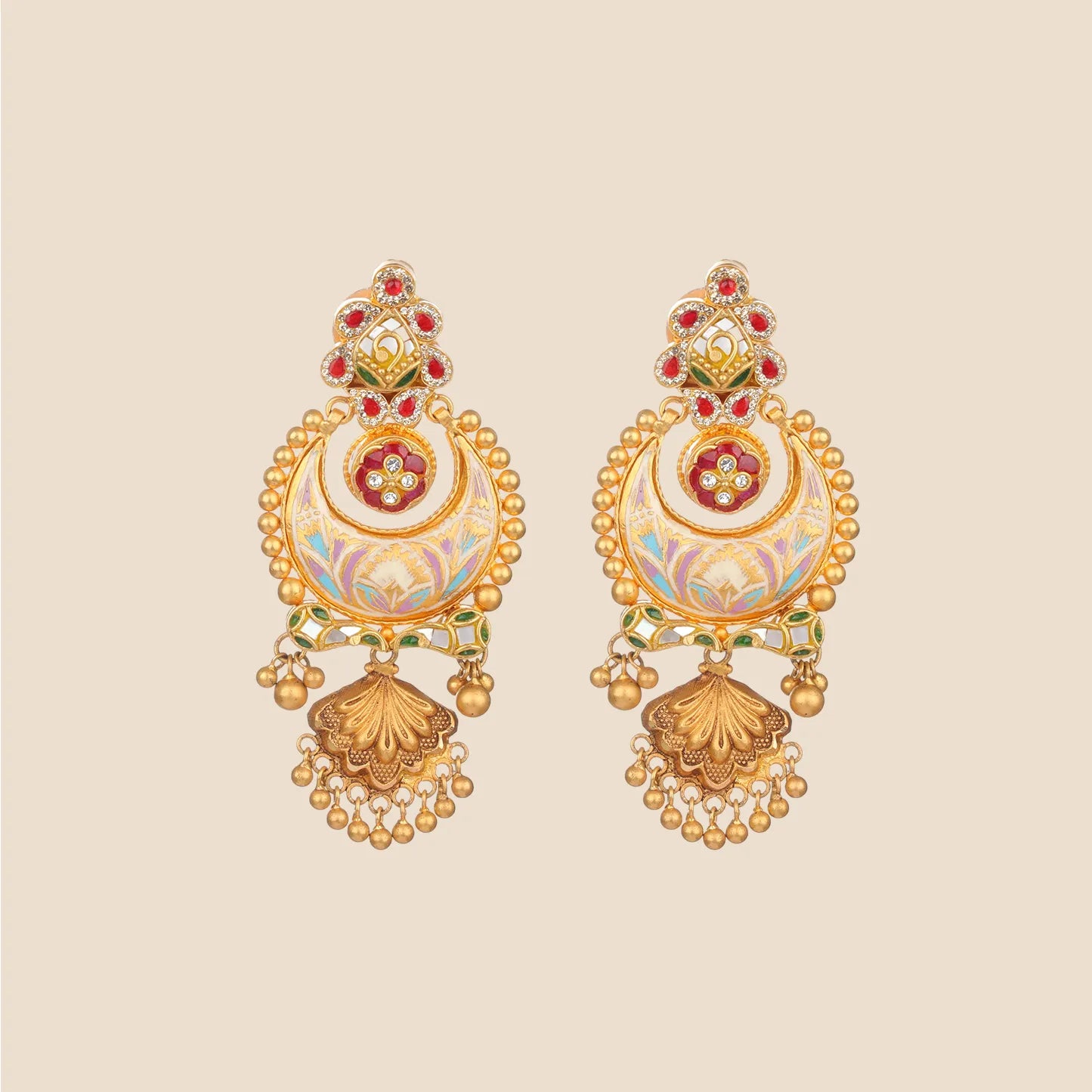 Gold chaandbali style earrings featuring a pastel enameled crescent design, red stone accents, and a textured gold drop with hanging beads.