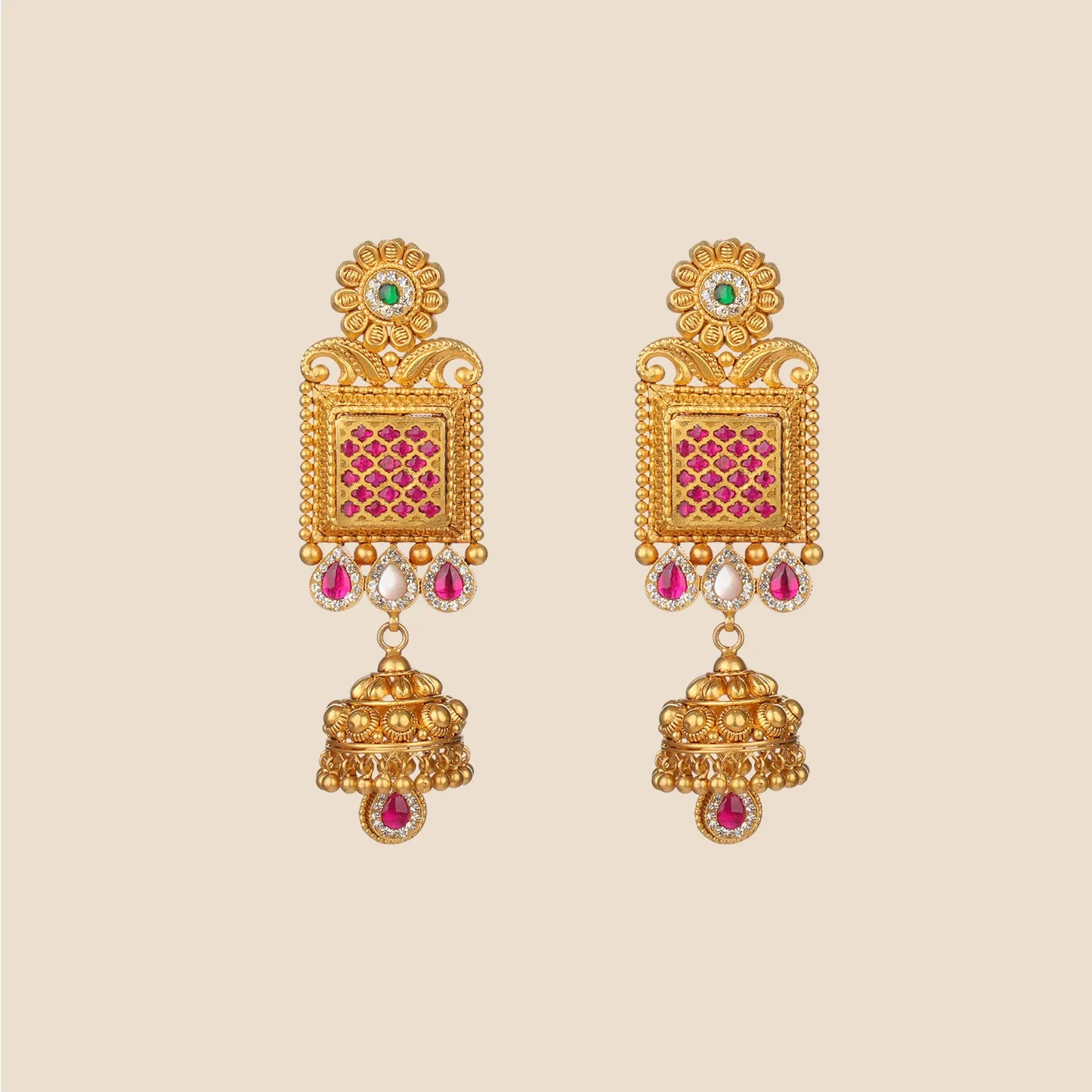 Gold jhumka earrings featuring a square center with pink stone lattice, a floral stud, and a dangling gold bell.