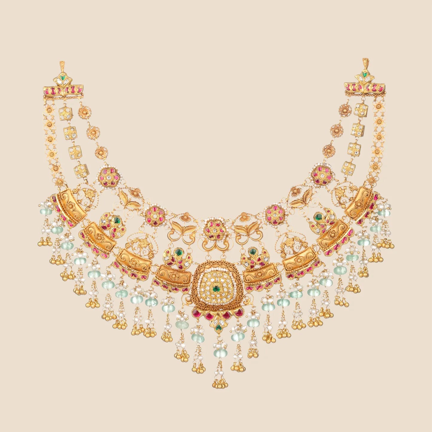 Ornate gold choker necklace with pink, green, and pearl accents and layered dangling bead fringe.