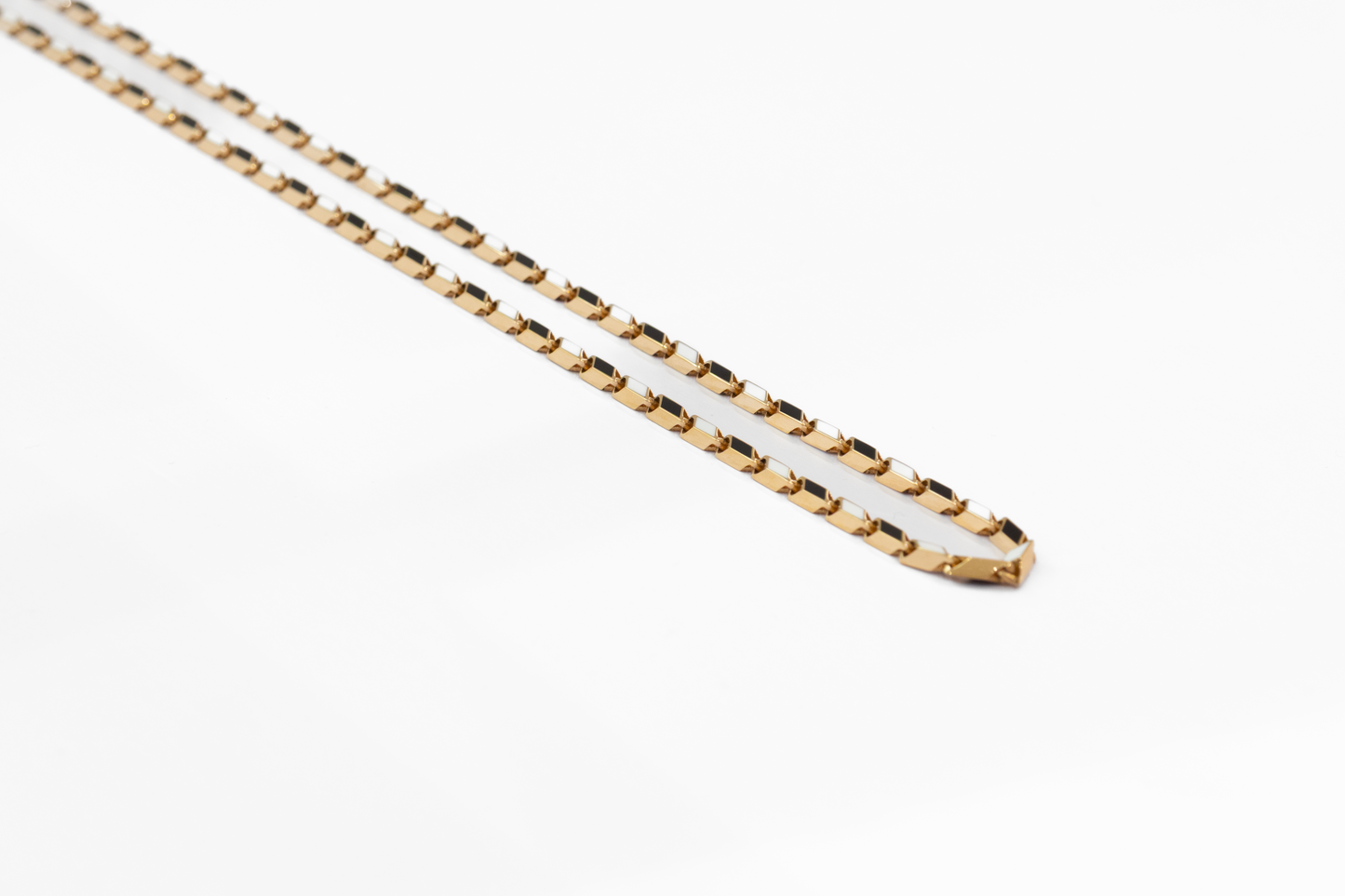 Gold chain on a white background