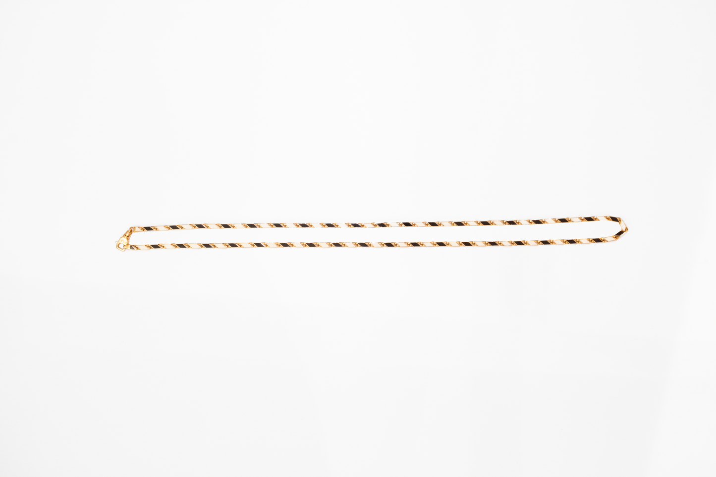 Gold hair clip on a white background