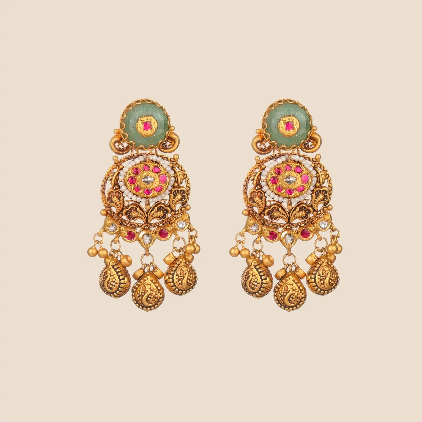 Detailed gold dangle earrings with a green stone top, a central motif with red stones and pearls, and three ornate hanging dangles.