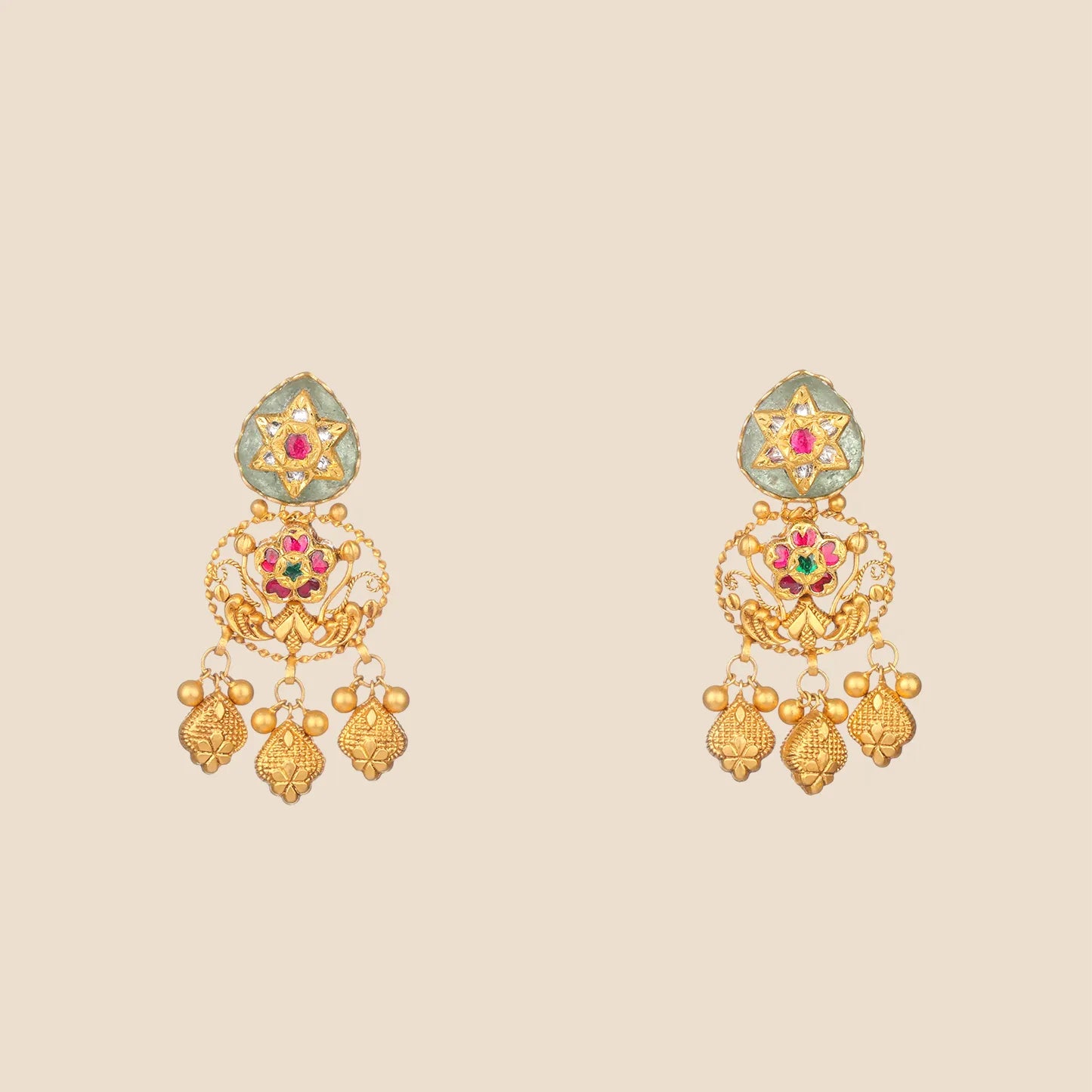 Gold filigree earrings with ruby and emerald accents and three dangling bead drops.