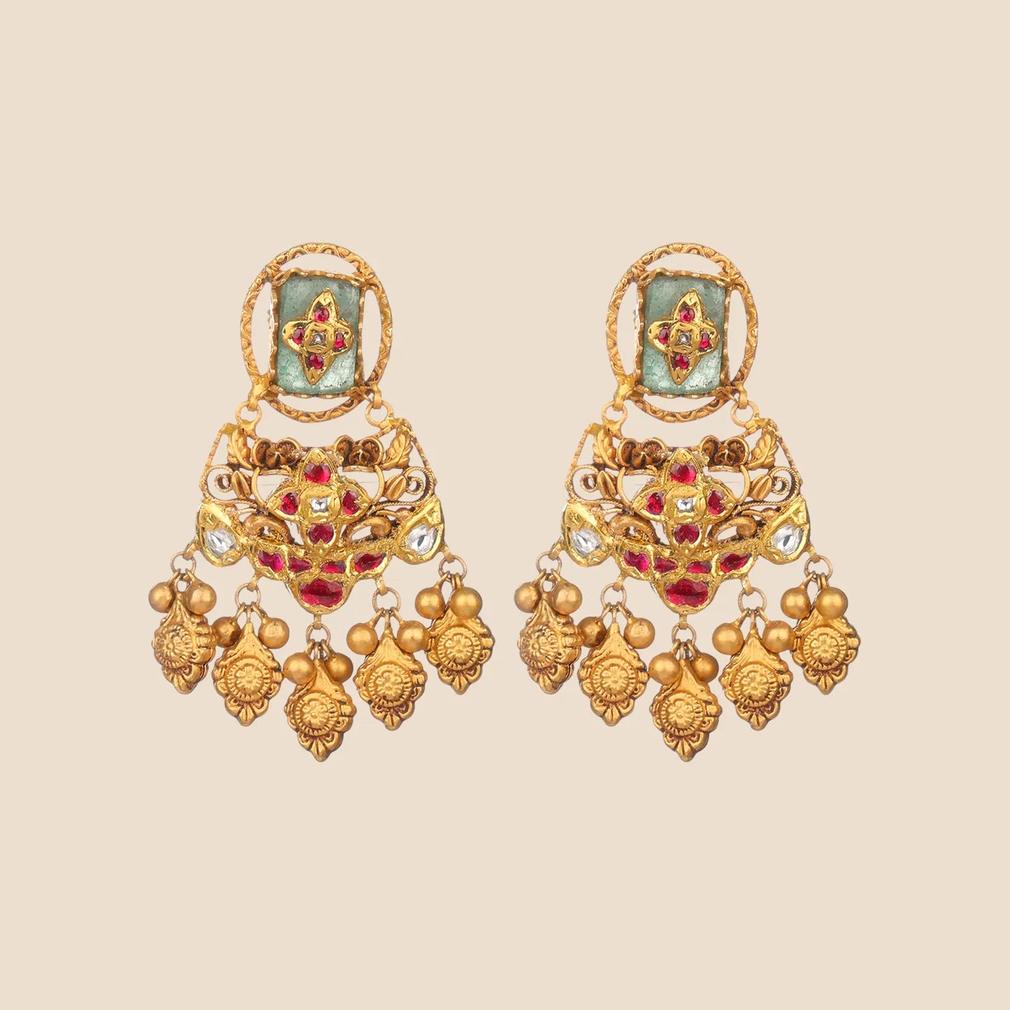 Pair of antique gold dangled earrings with red and green stones.