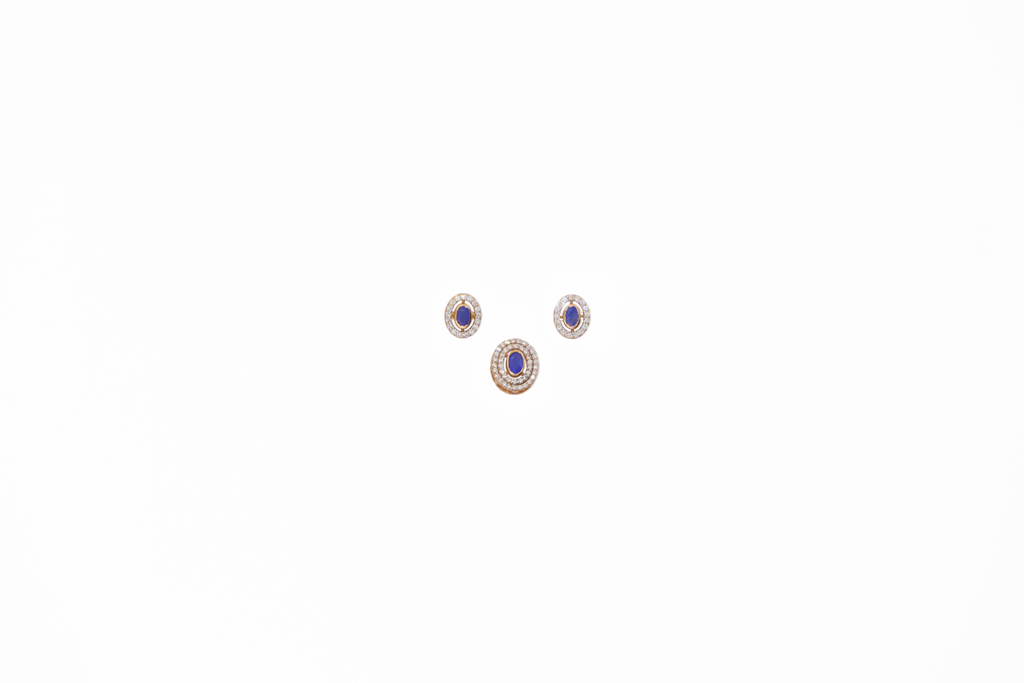 Pair of earrings with blue gemstones on a white background