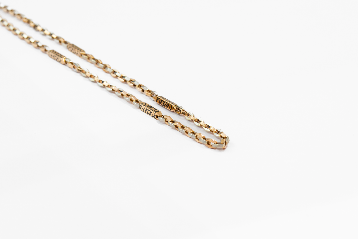 Gold chain on a white background