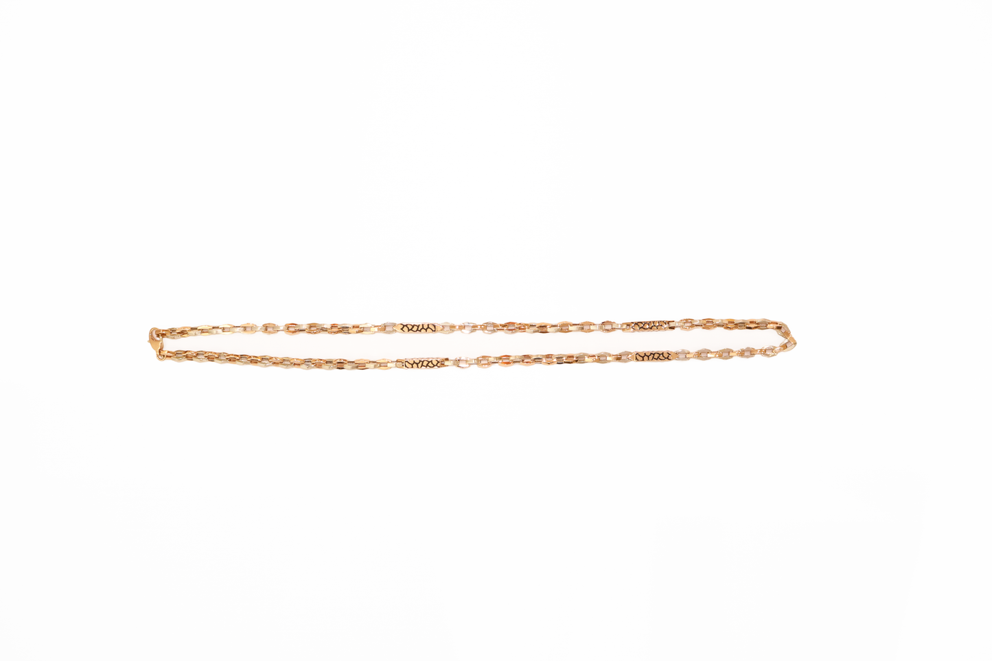 Gold chain on a white background