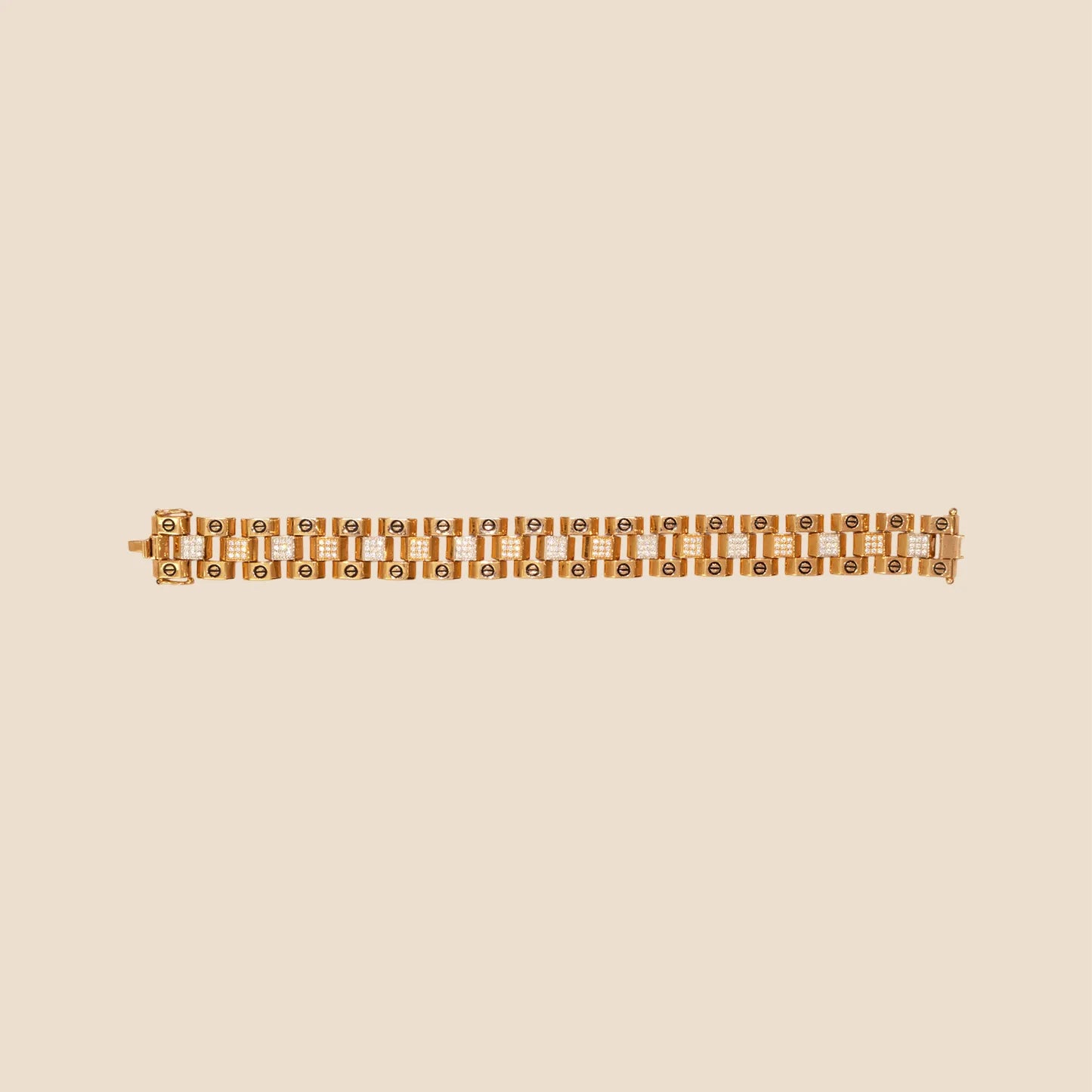 bracelet with embedded stones on a beige background