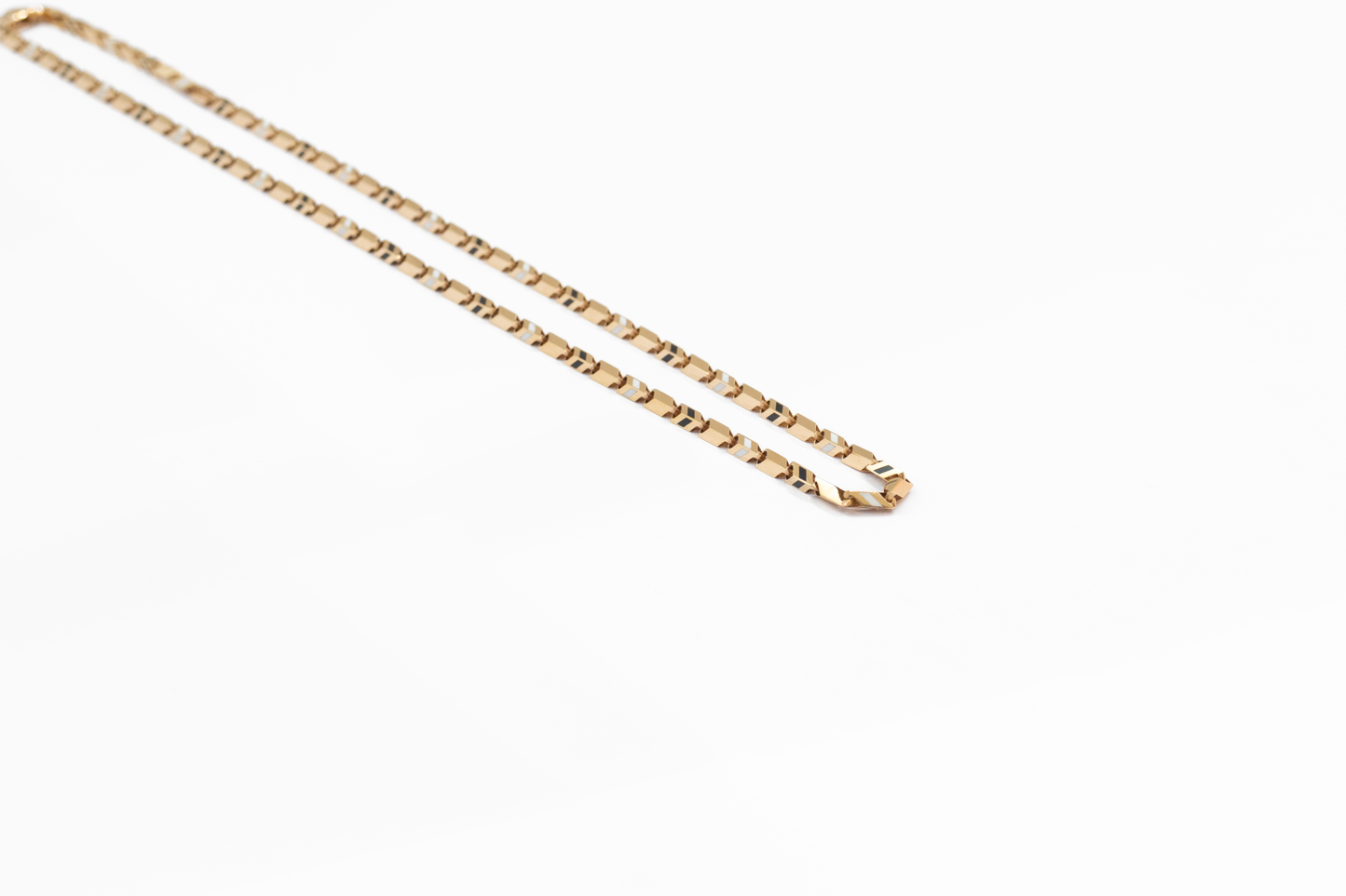 Gold chain on a white background