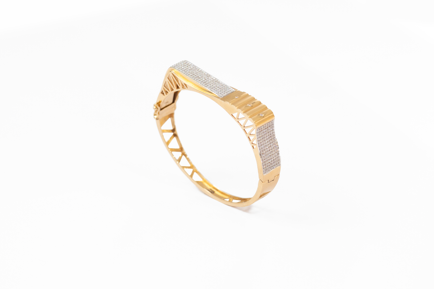 Gold bracelet with diamond accents on a white background