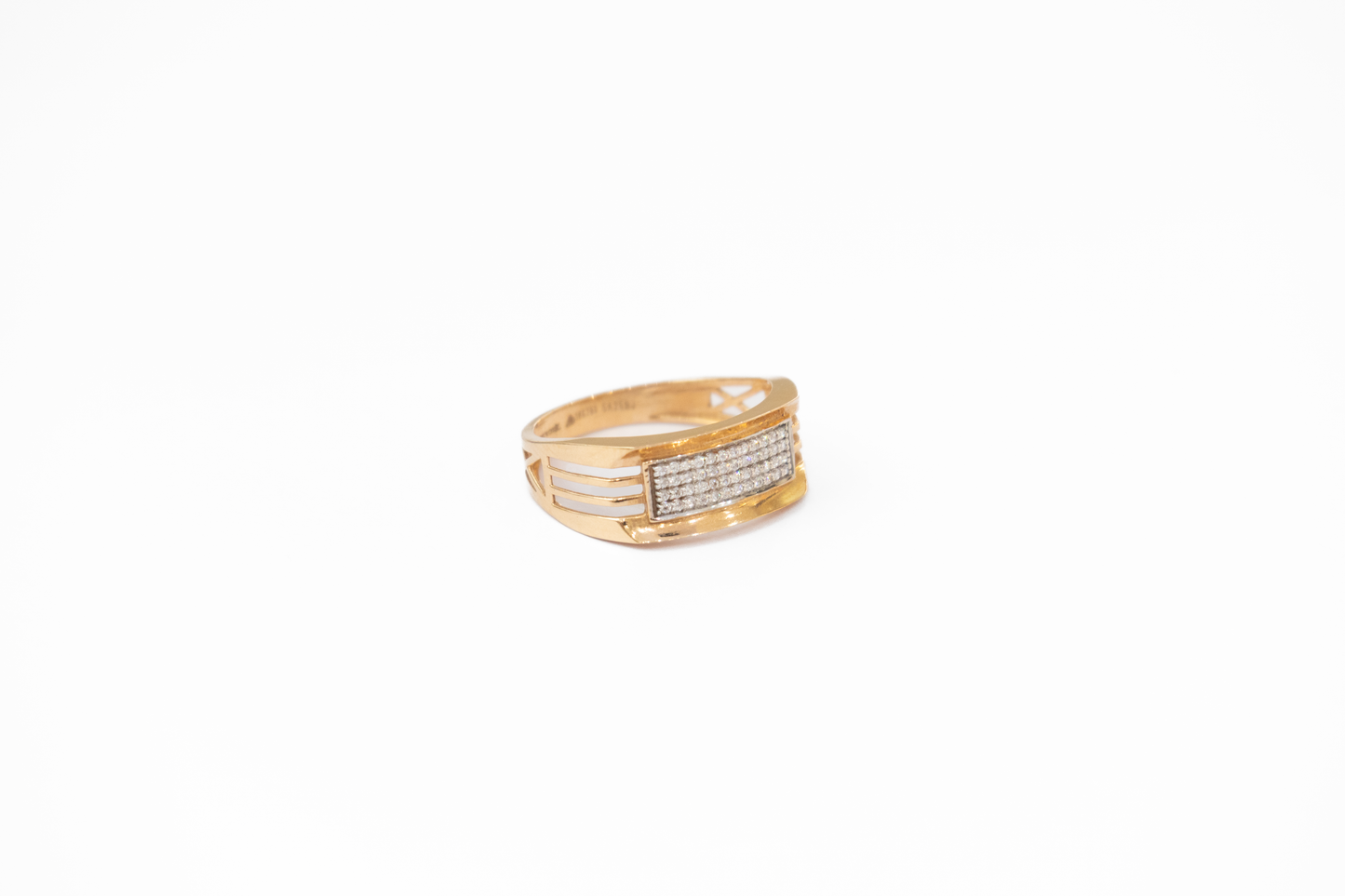 Gold ring with embedded diamonds on a white background