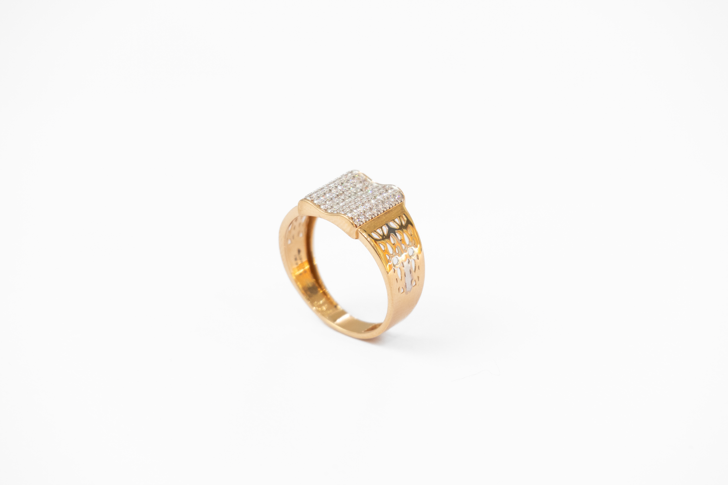 Gold ring with embedded diamonds on a white background