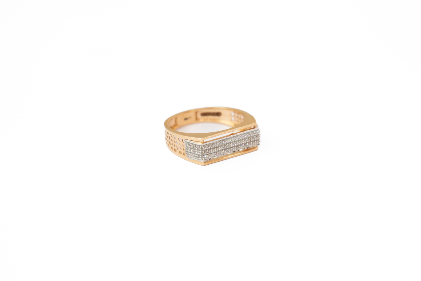 Gold ring with diamond accents on a white background