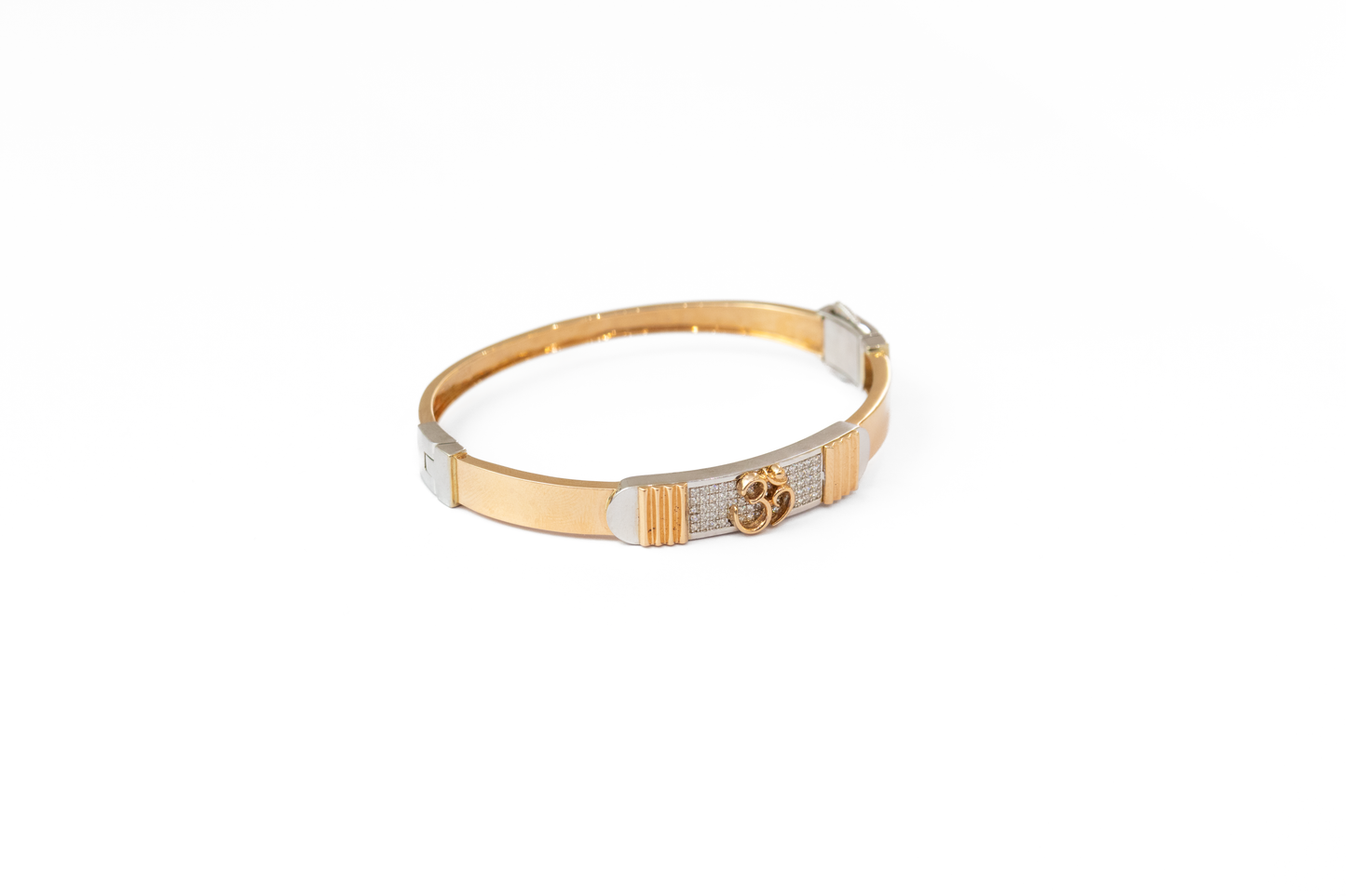 Gold and silver dog collar on a white background