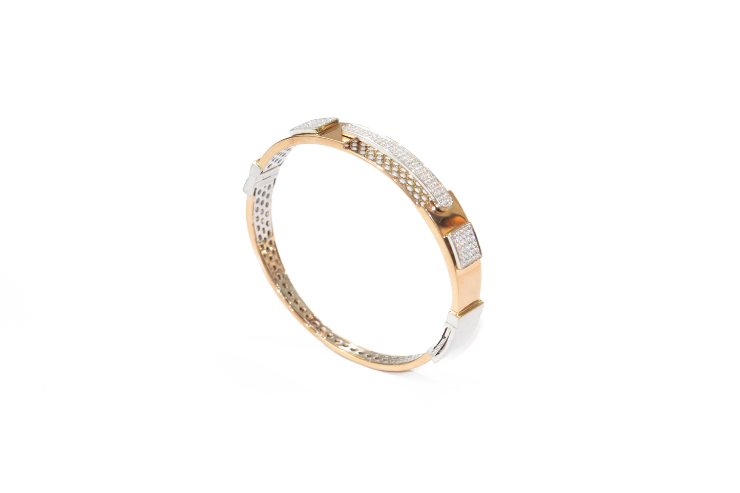 Gold and silver bracelet on a white background